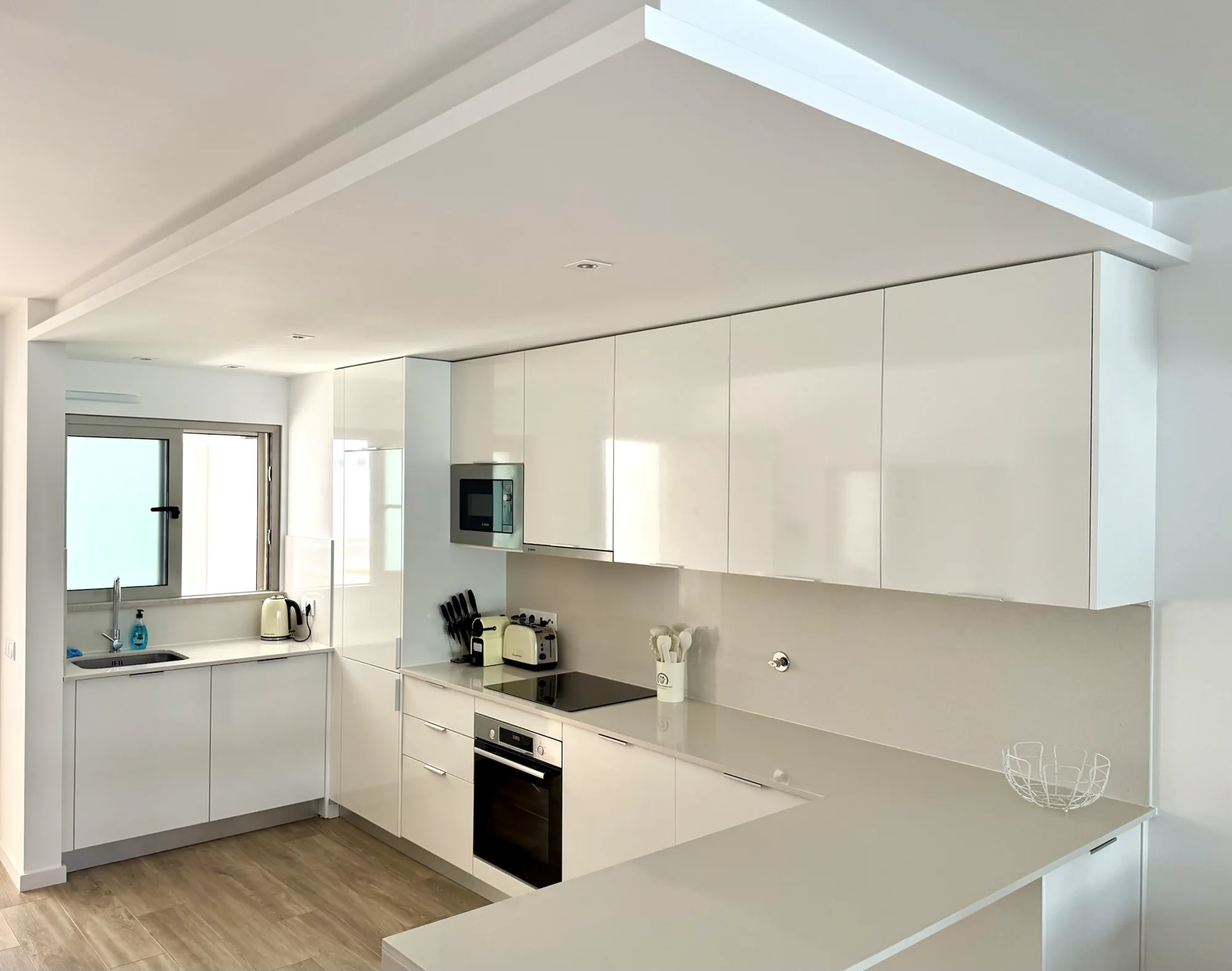 Fully equipped white kitchen