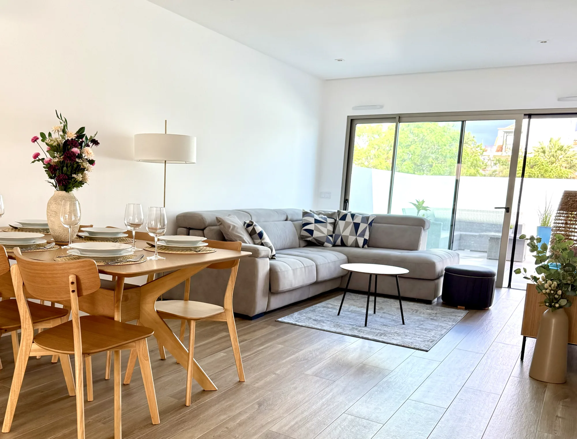 Open living and dining room with terrace access